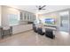 Bonus room with a popcorn machine, built-in shelves, and a television is perfect for entertainment at 9750 E Radioactive Dr, Mesa, AZ 85212