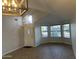 Welcoming entryway featuring natural light, tile flooring, and stylish lighting fixture at 9853 W Pontiac Dr, Peoria, AZ 85382