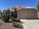 Charming single-story home featuring desert landscaping and a neutral color scheme at 9853 W Pontiac Dr, Peoria, AZ 85382