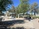Community park with picnic tables, bathrooms, and bike racks, and mature shade trees at 9853 W Pontiac Dr, Peoria, AZ 85382