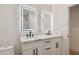 Modern bathroom featuring dual sinks, LED mirrors, and a white countertop at 1030 E Wescott Dr, Phoenix, AZ 85024