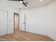 Bedroom featuring closet, ceiling fan, and modern wood floors at 1030 E Wescott Dr, Phoenix, AZ 85024