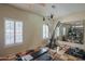 Bright exercise room with large mirror, and equipment at 10580 E Bella Vista Dr, Scottsdale, AZ 85258