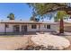 Outdoor living features a spacious patio area, mature palm trees, and a blank canvas for customization at 10610 W Diana Ave, Peoria, AZ 85345