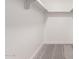 Empty walk-in closet with neutral carpet and white walls, ready for customization and storage at 10610 W Diana Ave, Peoria, AZ 85345