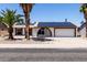 Inviting single-story home featuring solar panels, desert landscaping, and an arched entryway at 10610 W Diana Ave, Peoria, AZ 85345