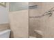Walk-in shower with tiled walls, and convenient corner seat at 1121 W Mission Dr, Chandler, AZ 85224