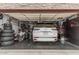 Organized garage featuring storage, a Jeep, and tools, providing space for vehicles and hobbies at 1121 W Mission Dr, Chandler, AZ 85224
