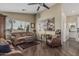 Inviting living room with comfortable seating, decorative rug, and view of the outdoors at 1121 W Mission Dr, Chandler, AZ 85224