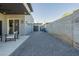 View of the home's backyard with sliding glass doors and access to the outdoor area at 1211 E Hayward Ave, Phoenix, AZ 85020