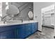 Modern bathroom with dual sinks, vessel sinks, and decorative mirrors at 1211 E Hayward Ave, Phoenix, AZ 85020