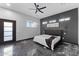 Spacious bedroom with modern accents, ample natural light, and a contemporary design at 1211 E Hayward Ave, Phoenix, AZ 85020