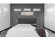 Modern bedroom with an accent wall and a contemporary design at 1211 E Hayward Ave, Phoenix, AZ 85020