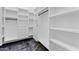 A custom walk-in closet with ample shelving and storage solutions at 1211 E Hayward Ave, Phoenix, AZ 85020