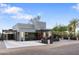 Modern home featuring a clean design, spacious driveway and inviting outdoor entertaining areas at 1211 E Hayward Ave, Phoenix, AZ 85020