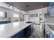 Spacious kitchen featuring stainless steel appliances, a large island, and an open-concept design at 1211 E Hayward Ave, Phoenix, AZ 85020