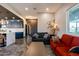 Open concept living room with island and modern polished concrete floors at 1211 E Hayward Ave, Phoenix, AZ 85020