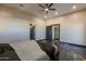 Spacious main bedroom with doors to en suite bathroom at 1211 E Hayward Ave, Phoenix, AZ 85020