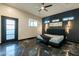 Spacious main bedroom featuring accent wall, modern lighting and windows at 1211 E Hayward Ave, Phoenix, AZ 85020
