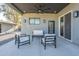 Back patio featuring modern furniture and a ceiling fan at 1211 E Hayward Ave, Phoenix, AZ 85020