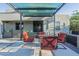 Relaxing covered patio with outdoor seating, perfect for entertaining guests or enjoying peaceful moments at 1211 E Hayward Ave, Phoenix, AZ 85020
