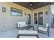 Back patio featuring modern furniture and a ceiling fan at 1211 E Hayward Ave, Phoenix, AZ 85020