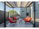 Outdoor patio with metal pergola, concrete base, seating, and fresh gravel at 1211 E Hayward Ave, Phoenix, AZ 85020