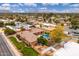 Aerial view of the property showcasing a pool, outdoor amenities, landscaping and neighborhood at 13206 N 64Th St, Scottsdale, AZ 85254