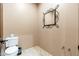Powder room featuring a decorative mirror, pedestal sink, and tile flooring at 13206 N 64Th St, Scottsdale, AZ 85254