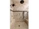 Walk-in shower with dual shower heads, built-in benches, and custom tile work for a spa-like experience at 13206 N 64Th St, Scottsdale, AZ 85254