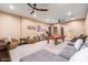 Inviting game room with a pool table, lounge area, and elegant decor at 13206 N 64Th St, Scottsdale, AZ 85254