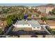Aerial view of the property showing the backyard and neighborhood at 13624 N 31St Ave, Phoenix, AZ 85029