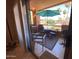 Private balcony with outdoor seating and a grill at 14950 W Mountain View Blvd # 2210, Surprise, AZ 85374