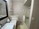 Modern bathroom features a large vanity, vessel sink, decorative mirror and glass enclosed shower at 14950 W Mountain View Blvd # 2210, Surprise, AZ 85374