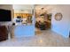 Open-concept kitchen and dining area with modern appliances and comfortable seating at 14950 W Mountain View Blvd # 2210, Surprise, AZ 85374