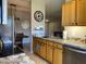 Well-lit kitchen featuring stainless steel appliances, granite countertops, and a view to the dining area at 14950 W Mountain View Blvd # 2210, Surprise, AZ 85374