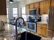 Bright kitchen with stainless steel appliances and a breakfast nook at 14950 W Mountain View Blvd # 2210, Surprise, AZ 85374