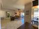 Comfortable living room featuring tile floors and a ceiling fan at 14950 W Mountain View Blvd # 2210, Surprise, AZ 85374