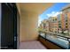 This balcony offers views of an outdoor pool and a neighboring building at 16 W Encanto Blvd # 305, Phoenix, AZ 85003