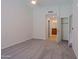 Bedroom featuring carpet, a closet, and an ensuite bath and kitchen view at 16 W Encanto Blvd # 305, Phoenix, AZ 85003
