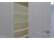 Walk in closet with built in shelving at 16 W Encanto Blvd # 305, Phoenix, AZ 85003