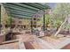 Landscaped courtyard with benches and shaded seating areas at 16 W Encanto Blvd # 305, Phoenix, AZ 85003