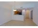 Bright dining area with tile floors with an open view to the kitchen at 16 W Encanto Blvd # 305, Phoenix, AZ 85003