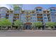 Attractive multi-story building with manicured landscaping and inviting entrance at 16 W Encanto Blvd # 305, Phoenix, AZ 85003