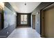 Hallway leading to elevators. Modern artwork on the wall at 16 W Encanto Blvd # 305, Phoenix, AZ 85003