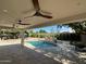 Inviting backyard with a pool, patio, and covered seating area at 16227 N 63Rd Pl, Scottsdale, AZ 85254