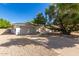 Charming single-story home featuring a large garage and mature landscaping at 16227 N 63Rd Pl, Scottsdale, AZ 85254