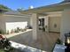 Inviting front porch with double doors, stone pavers, seating area, and manicured landscaping creates a welcoming entrance at 16227 N 63Rd Pl, Scottsdale, AZ 85254