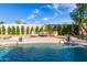 Backyard pool with fountains and greenery offers an oasis for relaxation and entertaining in the Arizona sun at 16227 N 63Rd Pl, Scottsdale, AZ 85254