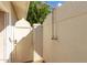 Outdoor shower featuring a showerhead and a private wall at 16227 N 63Rd Pl, Scottsdale, AZ 85254